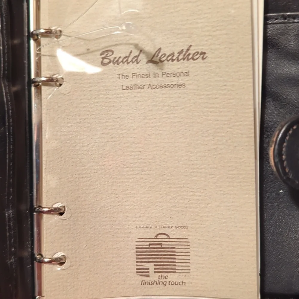 Two midi Budd fine leather pocket diary agenda books with snap closure.